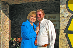 Image of Sandy and Herman in front of the Opal Cave entrance